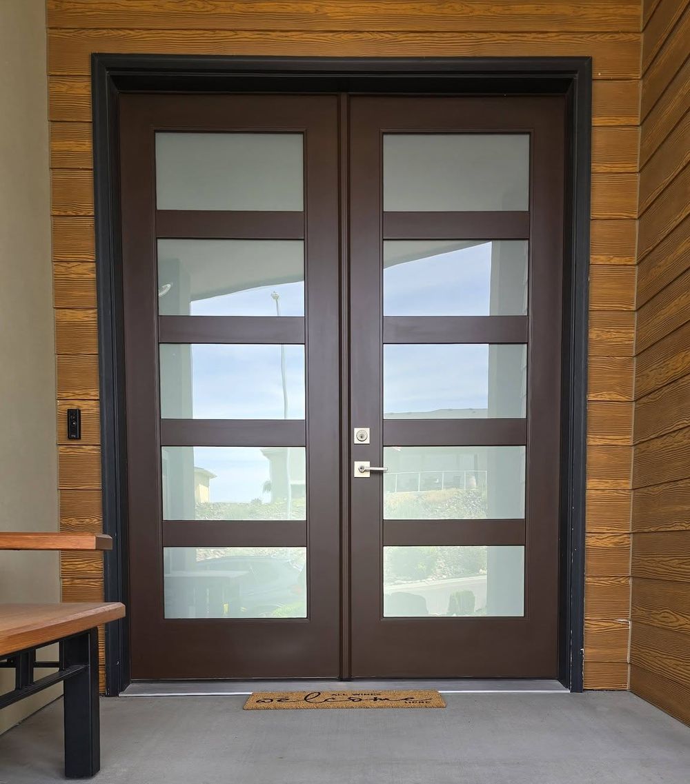 Brown double entry door with frosted glass lites after Speedy's refinished it