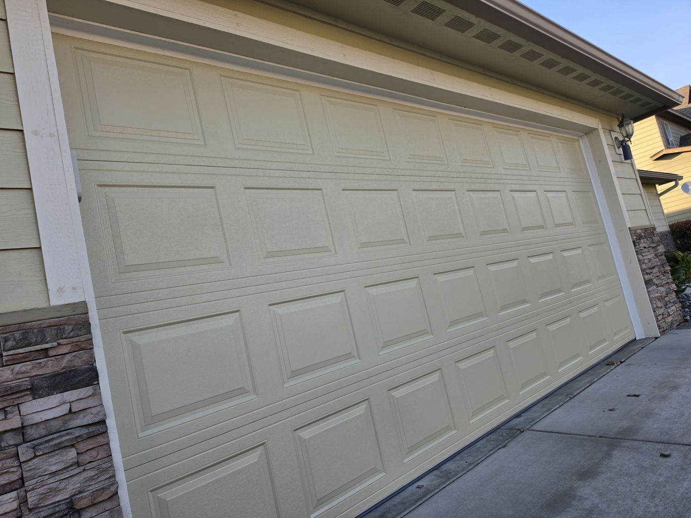 Two-car garage door and trim on a Speedy's exterior repair job