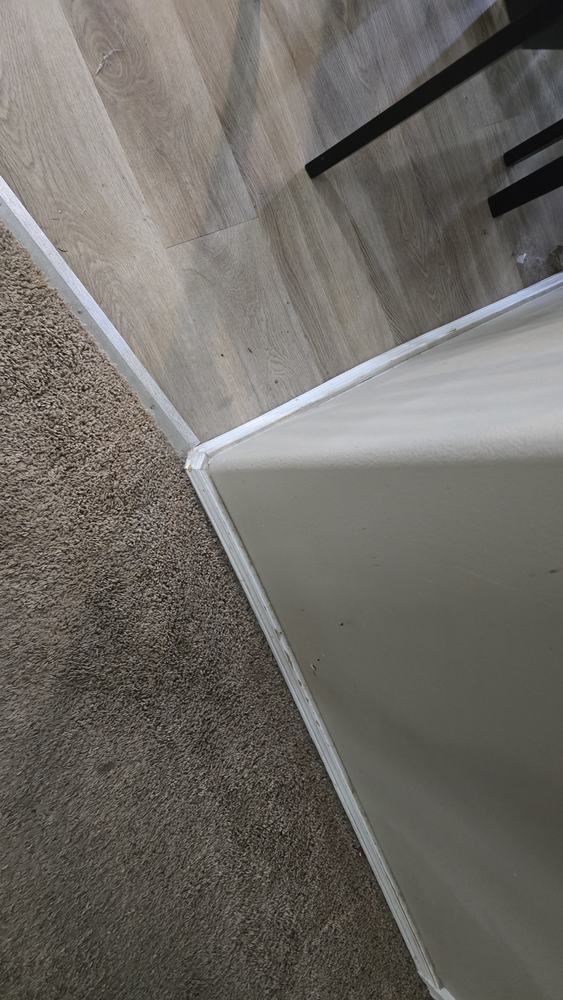 Long baseboard run after repair and repaint