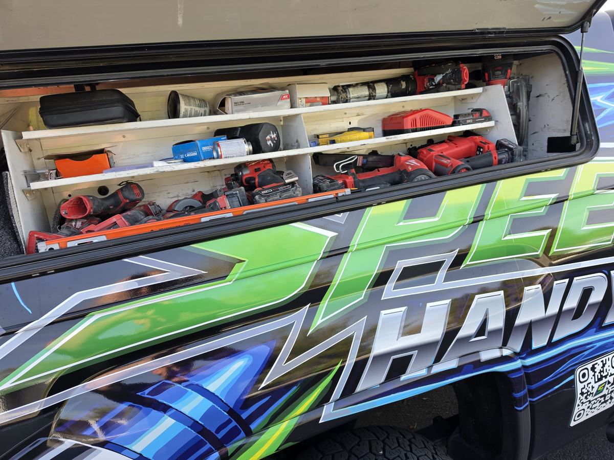 Speedy's Handyman truck bed loaded with organized tools