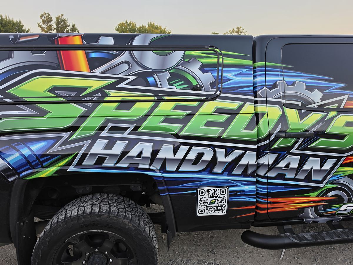 Close-up of the Speedy's Handyman truck wrap